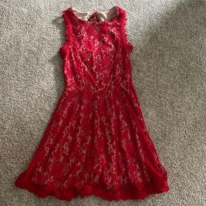 Red dress with cream under layer